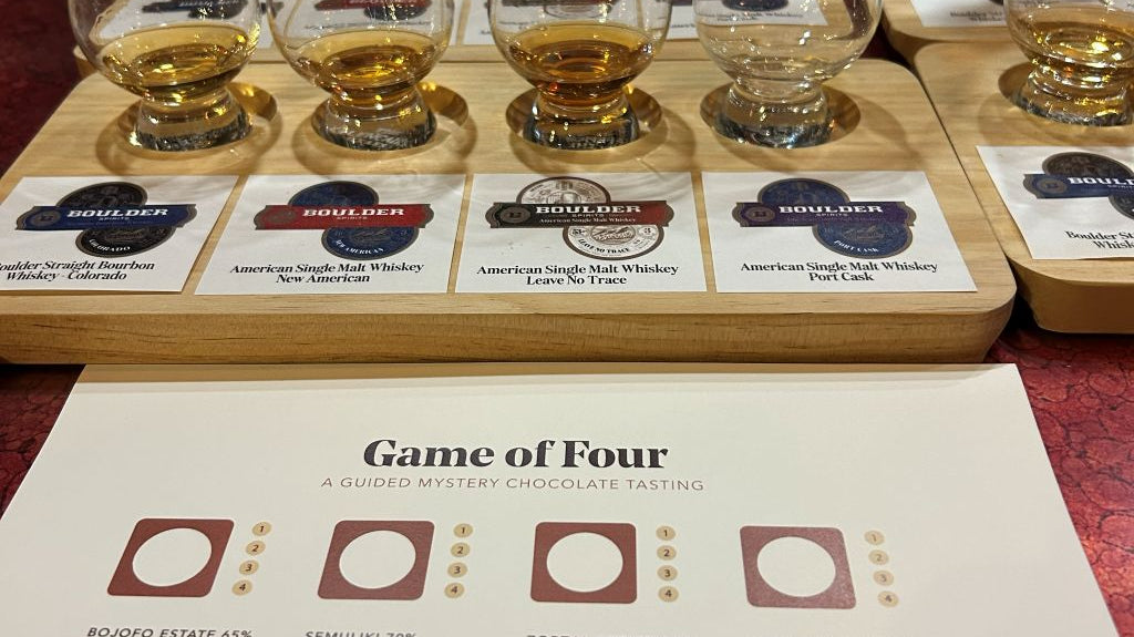 Whiskey and single-origin chocolate pairing at a Moksha Chocolate craft tasting event in Boulder, Colorado