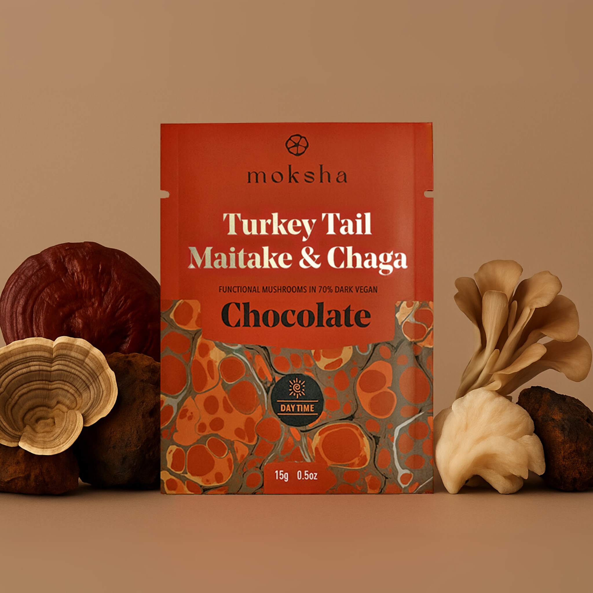 Moksha Turkey Tail Maitake & Chaga chocolate package with mushrooms on a brown background