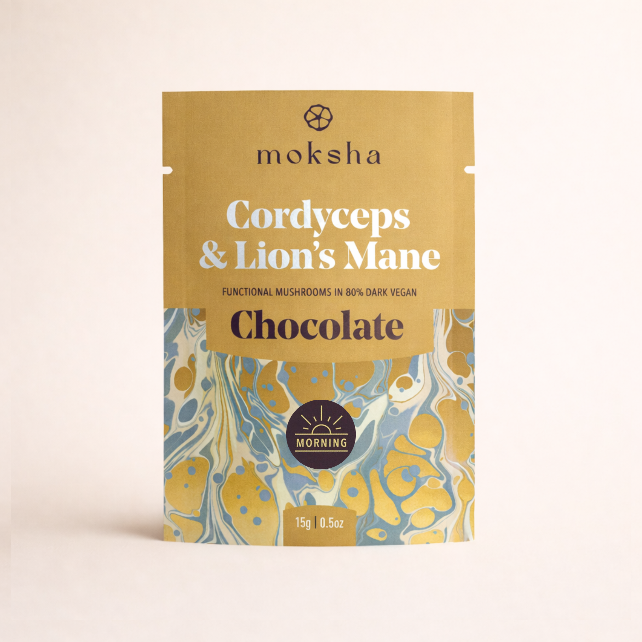 Moksha Cordyceps & Lion’s Mane mushroom chocolate in gold packaging, featuring functional mushrooms in 80% dark vegan chocolate, Morning blend, 15g pouch.