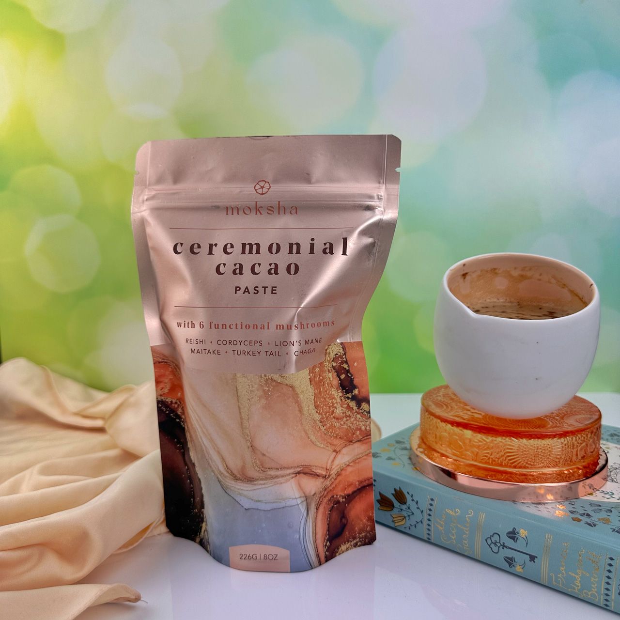 Moksha functional mushroom cacao with a white cacao cup