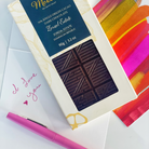Moksha Zorzal Estate 70% Dark Chocolate Bar with handwritten “I love you” note and abstract greeting card – artisan chocolate gift for special occasions.