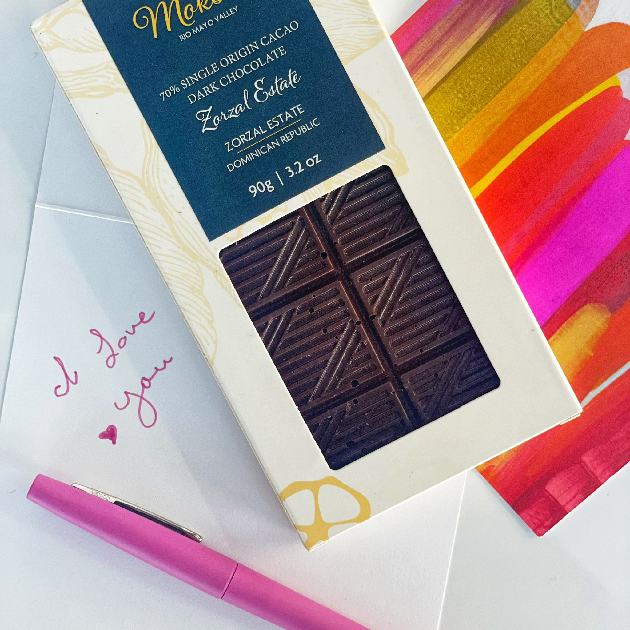 Moksha Zorzal Estate 70% Dark Chocolate Bar with handwritten “I love you” note and abstract greeting card – artisan chocolate gift for special occasions.