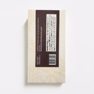 Back view of a product packaging with text and barcode on a white background