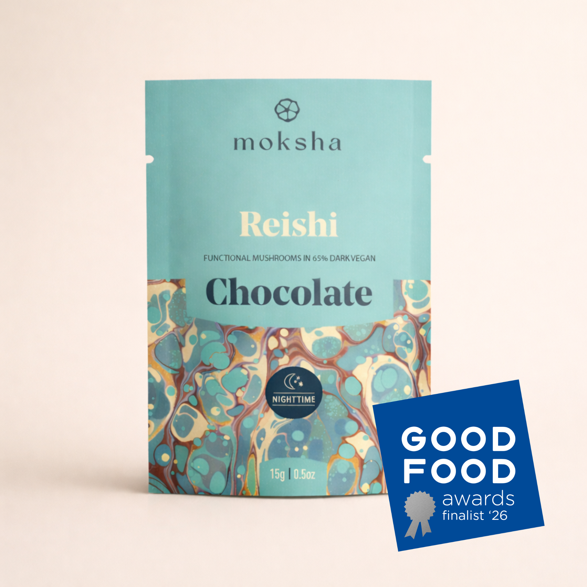 Moksha Reishi mushroom chocolate, a 65% dark vegan chocolate made with functional reishi mushrooms, shown in teal packaging with a Good Food Awards finalist 2026 badge.